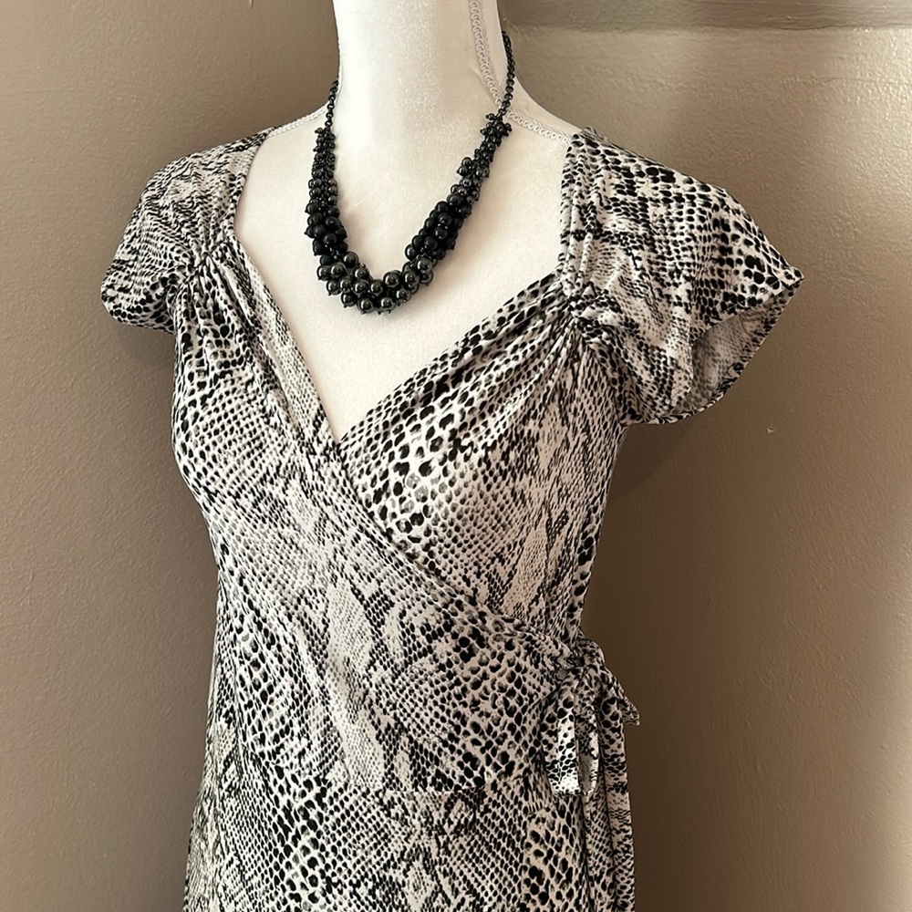 Norma Kamali grey, cream, black snake reptile print wrap dress.